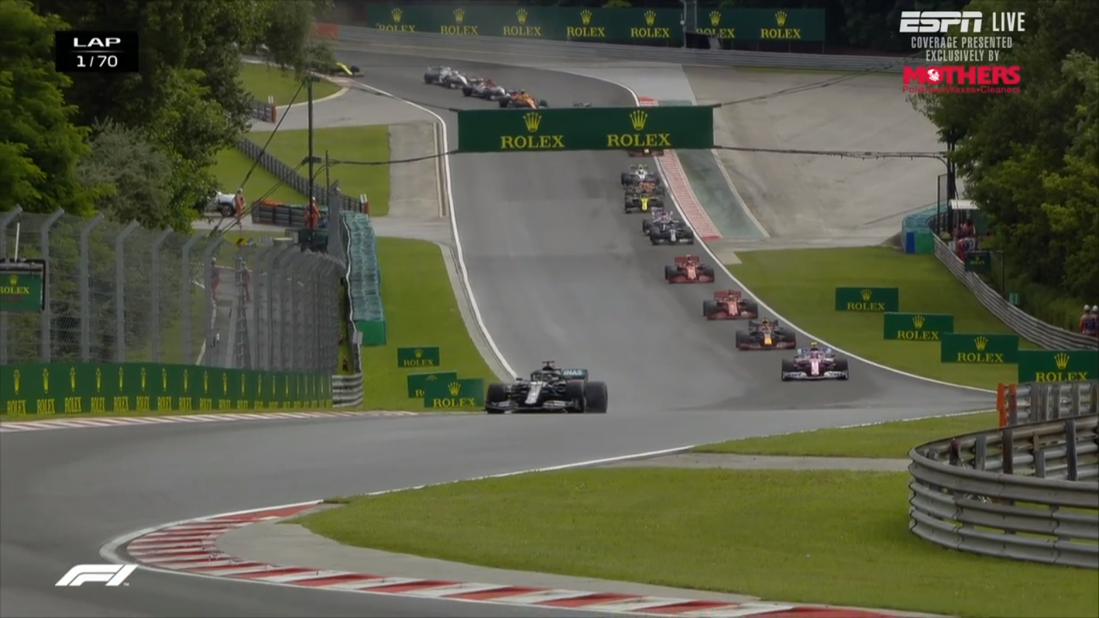 Lewis Hamilton out in front on Lap 1; the field takes the 'racing line' out of one turn to line up for the apex of the next turn.