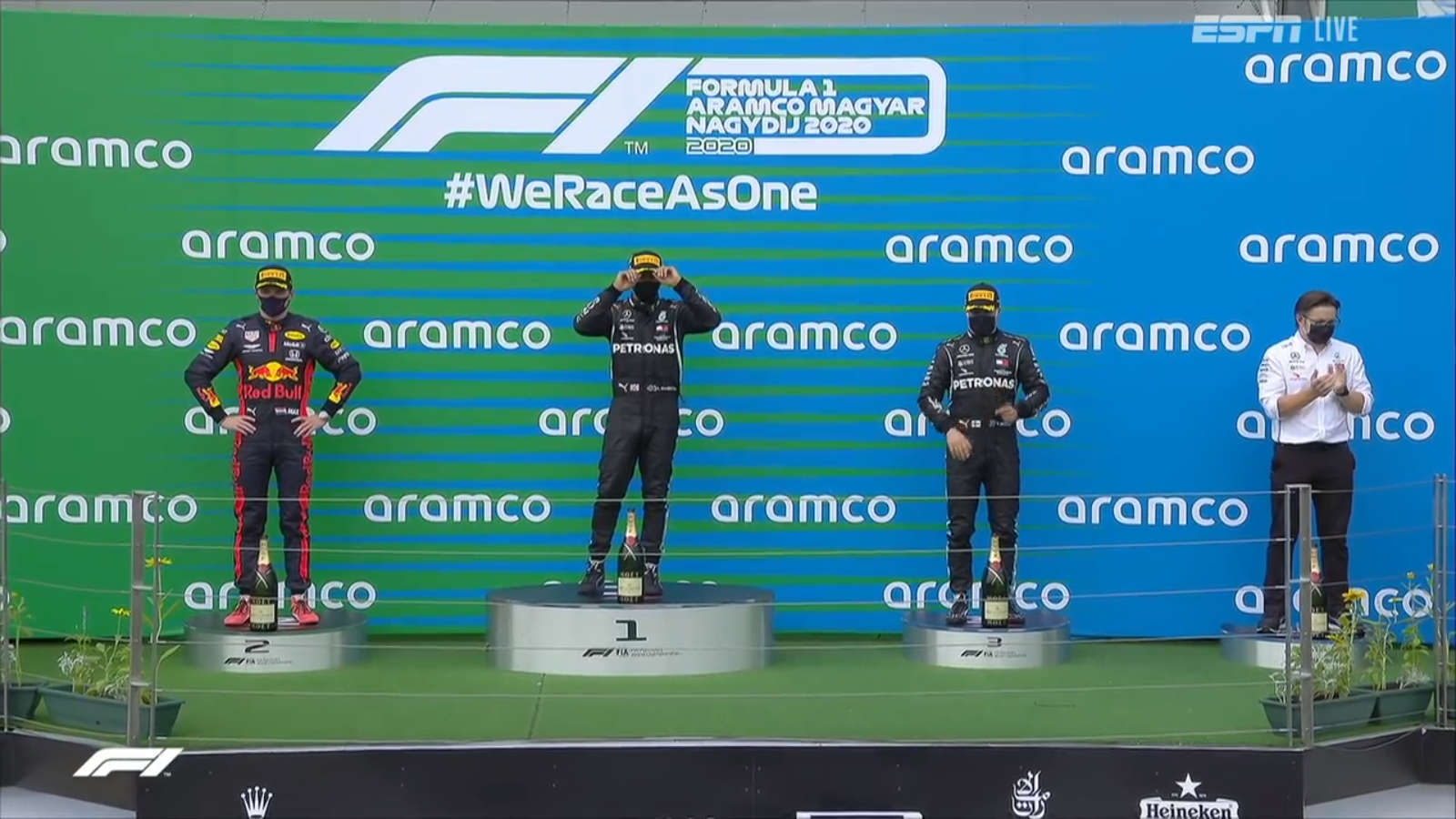 The Podium: Hungarian Formula 1 Grand Prix 2020 winner Lewis Hamilton for Mercedes-AMG (2nd from the left); 2nd place for Red Bull Racing Honda, Max Verstappen (far left); 3rd place for Mercedes-AMG Valtteri Bottas (2nd from right) and accepting the Constructors award for Mercedes-AMG race engineer Peter Bonnington.